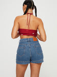 back view of model wearing Princess Polly Gazelle Denim Skort Mid Wash High Waisted Shorts 