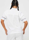 Front view of model wearing  front Princess Polly Short Sleeves Square Neck  Sun Time Shirt White / Blue