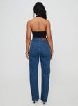 back view of model wearing Princess Polly Kalinda Denim Jeans Mid Blue High Waisted 