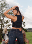 Front view of model wearing  front Princess Polly Sleeveless Scoop Neck  Willson Vest Dark Wash Denim