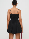 back view of model wearing Princess Polly Matisse Mini Dress Black Scoop Neck 