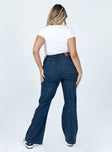 back view of model wearing Princess Polly Odette Flare Denim Jeans Blue High Waisted 