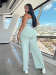 Front view of model wearing  front Princess Polly High Waisted Pants High Waisted Pants Low Rise Pants  Archer Pants Green Curve