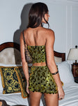 back view of model wearing Princess Polly Riego Mini Skirt Green Mini Skirts 