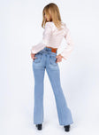 back view of model wearing Princess Polly Tampico Flare Leg Denim Jeans High Waisted 