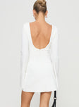 back view of model wearing Princess Polly Carters Long Sleeve Mini Dress White Crew Neck 