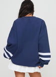 back view of model wearing Princess Polly Snoopy Star Tennis Club Sweater Navy Long 