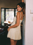 back view of model wearing Princess Polly Cruel Summer Lace Mini Dress Cream Sweetheart Neckline 