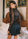 back view of model wearing Princess Polly Pentacles Lace Mini Skirt Black Mini Skirts 