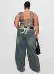 back view of model wearing Princess Polly Ribbon Stamp Wide Leg Jean Antique Wash Curve High Waisted 