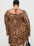 back view of model wearing Princess Polly Halo Bias Mini Dress Leopard Curve Boat Neck 