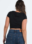 Front view of model wearing  front Princess Polly Short Sleeves Square Neck  Heartbreak Tee Black