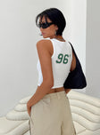 Front view of model wearing  front Princess Polly Sleeveless Crew Neck  1996 Tank Top White