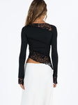 Front view of model wearing  front Princess Polly Full Sleeves Square Neck  Motel Lucca Top Lace Black