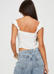 back view of model wearing Princess Polly Rinza Top White Sleeveless Square Neck 