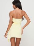 back view of model wearing Princess Polly Twyla Strapless Mini Dress Yellow Asymmetric Neckline 