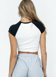 back view of model wearing Princess Polly Club Polly Baby Tee White / Black Sleeveless High Neck 