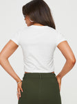 Front view of model wearing  front Princess Polly Short Sleeves Square Neck  Arri Top White