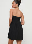 back view of model wearing Princess Polly Osment Strapless Mini Dress Black Straight Neck 