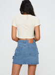 back view of model wearing Princess Polly Chillders Denim Mini Skirt Mid Wash Tall Mini Skirts 