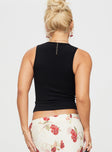 back view of model wearing Princess Polly Mellifluous Top Black Sleeveless Crew Neck 