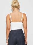 back view of model wearing Princess Polly Hollywood Boulevard Top White Sleeveless V-Neck 