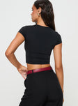 back view of model wearing Princess Polly Darius Top Black Short Sleeves V-Neck 