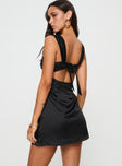 back view of model wearing Princess Polly Ackerley Mini Dress Black Square Neck 