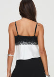 back view of model wearing Princess Polly First Class Top White / Black Sleeveless V-Neck 