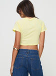 back view of model wearing Princess Polly Kewpie Best Of Friends Baby Tee Yellow Short Sleeves Crew Neck 