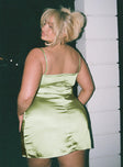 Front view of model wearing  front Princess Polly Square Neck  Kenzie Mini Dress Green Curve