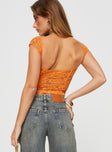 back view of model wearing Princess Polly Shakman Lace Top Orange Short Sleeves Sweetheart 