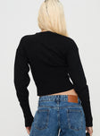 back view of model wearing Princess Polly Head In The Clouds Cardigan Onyx cropped 