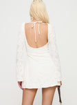 back view of model wearing Princess Polly Lukea Lace Long Sleeve Mini Dress Cream Boat Neck 