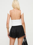 back view of model wearing Princess Polly Snooze Satin Boxer Short Black High Waisted Shorts 