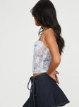 back view of model wearing Princess Polly Kemmie Top Blue / Multi Sleeveless Square Neck 