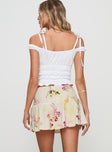 back view of model wearing Princess Polly Sassie Mini Skirt Floral Mini Skirts 