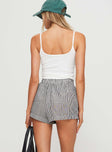 back view of model wearing Princess Polly Sincar Boxer Shorts Black / White Stripe High Waisted Shorts 