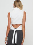 back view of model wearing Princess Polly Campus Long Line Vest White Sleeveless V-Neck 