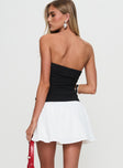 back view of model wearing Princess Polly First Impressions Strapless Mini Dress Black / White Straight Neck 