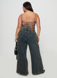 back view of model wearing Princess Polly Ziggie Low Rise Ultra Baggy Jeans Antique Wash Curve High Waisted 