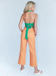 back view of model wearing Princess Polly Ivy Floral Straight Leg Jeans Orange Mid Rise 