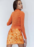 back view of model wearing Princess Polly Theordore Mini Skirt Orange 