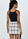 back view of model wearing Princess Polly Selby Mini Skirt Yellow Plaid 