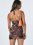 back view of model wearing Princess Polly Chrissy Mini Dress Brown Swirl 