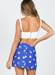 back view of model wearing Princess Polly Selby Mini Skirt Blue Floral 