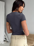 Front view of model wearing  front Princess Polly Short Sleeves High Neck  Lowell Top Grey