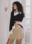 side view of model wearing Princess Polly Antonia Sweater Vest Black Cropped 