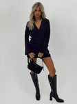 Front view of model wearing  front Princess Polly V-Neck  Kyah Wrap Blazer Dress Black