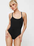 side view of model wearing Princess Polly Prida Scoop Neck Bodysuit Black Sleeveless Scoop Neck 